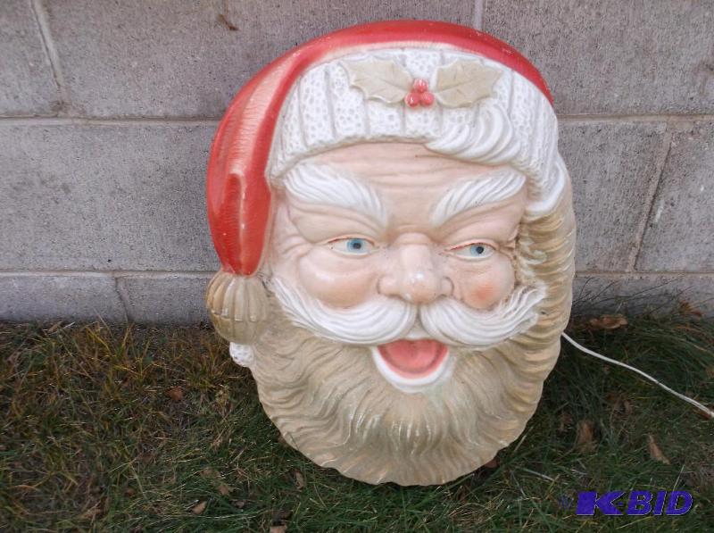 lot 24 image: Lighted hanging Santa face measuring 13"...