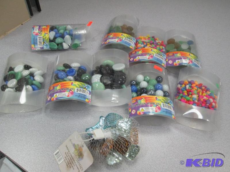 Qty 9 pkg of different kinds of marbles...