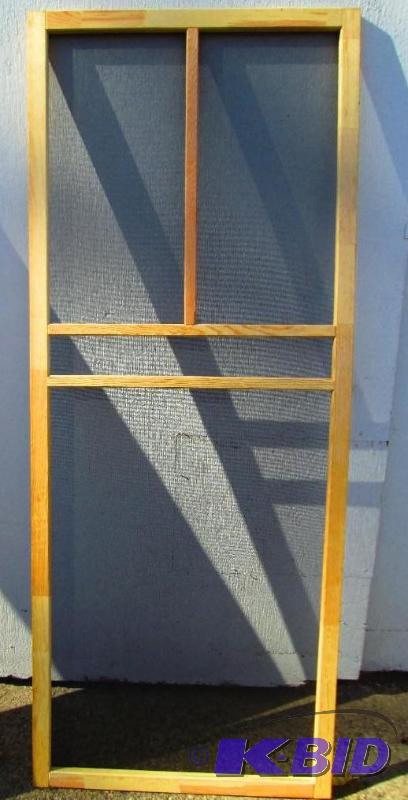 lot 15 image: Wood t-bar 32 inch screen door, new...