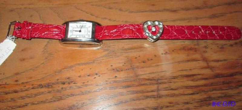 lot 30 image: Quartz watch with red band and heart...