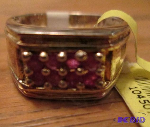 lot 37 image: Ruby sterling silver ring...