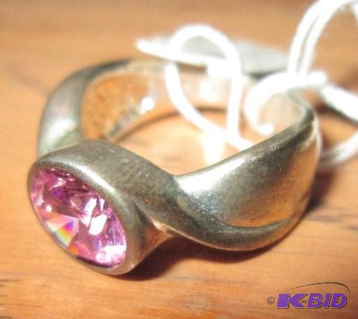 lot 38 image: Pink cubic zirconium ring...