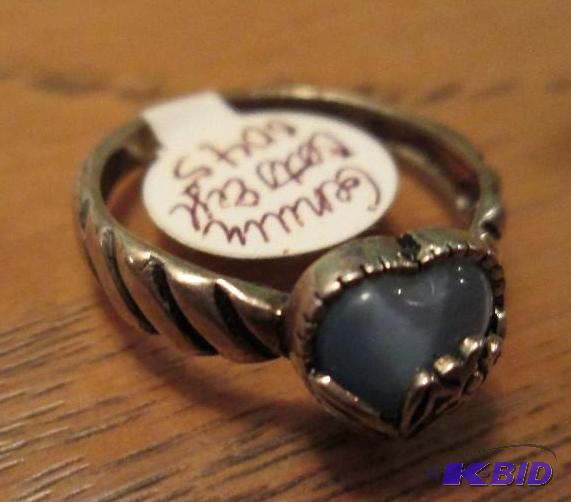 lot 55 image: Catseye heart ring...