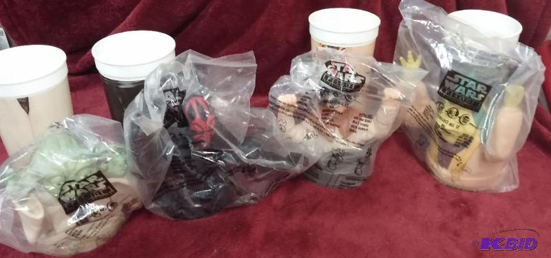 LOT OF 4 CUPS WITH CUP TOPPERS....