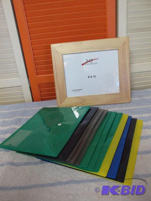 lot 112 image: 12 Plastic Folders and a Brand New Picture Frame