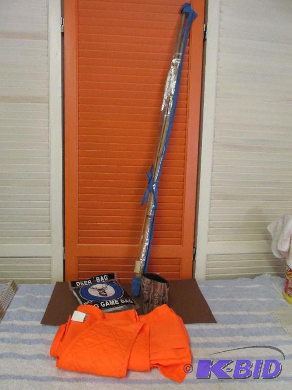 lot 132 image: Hunting Vest, Bamboo pole and a Big Game Bag.