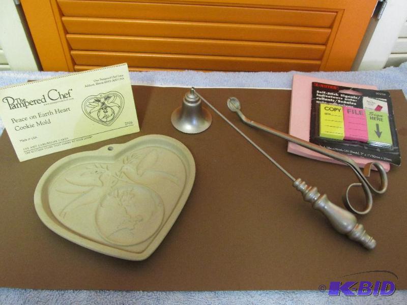 lot 137 image: The Pamped Chef Cookie Mold, a Candle Snuffer and some other stuff.