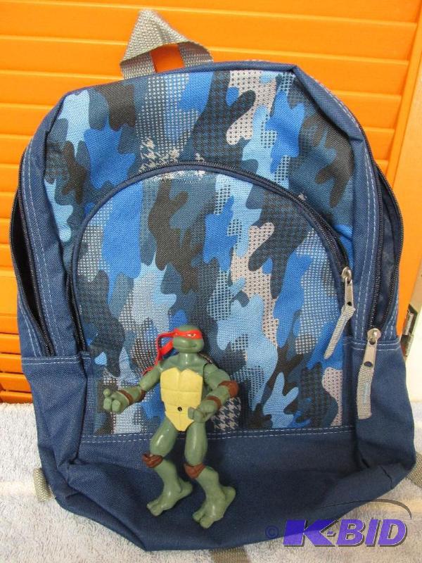 lot 143 image: Back Pack and a Ninja Turtle