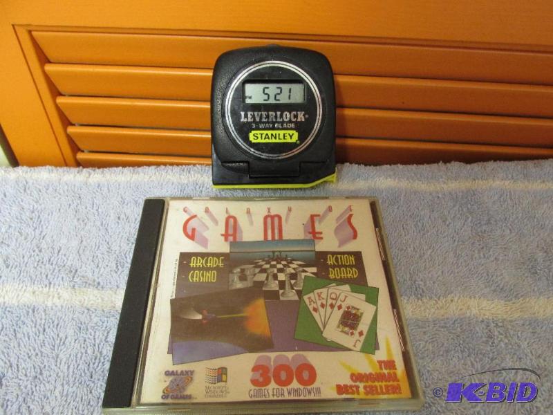 lot 148 image: COOL -- Stanley Talking Alarm Clock  and some Computer Games