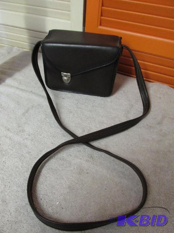 lot 43 image: Carrying Case and 4 Cassettes