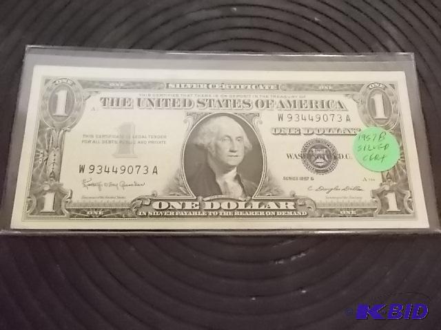 lot 20 image: 1957 B Series One Dollar Silver Certificate...
