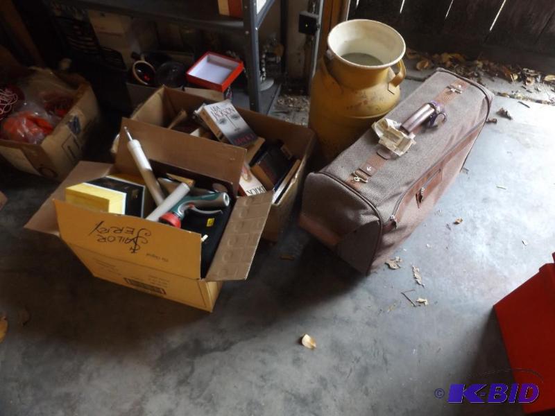 lot 29 image: box of books, box of misc, milk can, old suit...