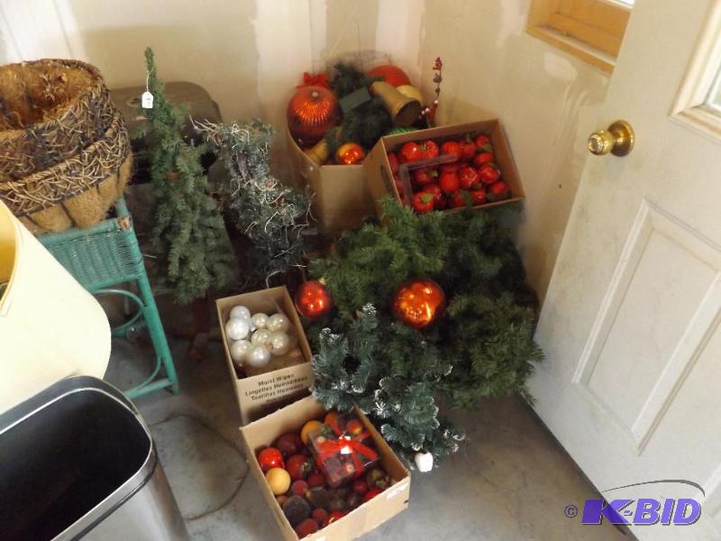 lot 30 image: boxes of holiday decorations and garland...