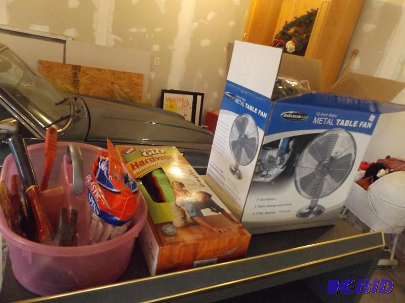 lot 53 image: golf balls, futon cover, hardwood floor care ...