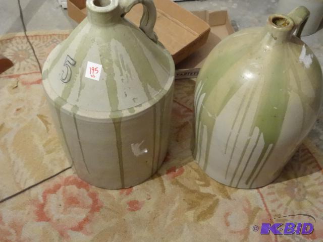 2 vintage Crock Jugs. One of them has a #5 on...