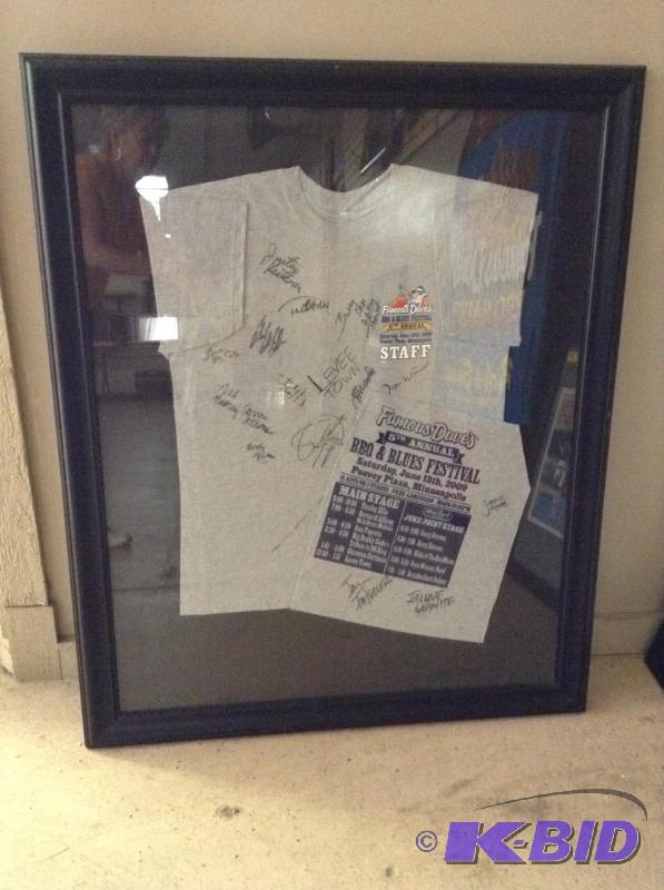 lot 7 image: Framed 2009 BBQ & Blues Festival Autographed Shirt