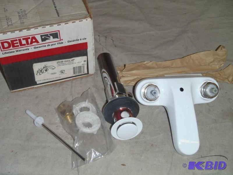 lot 62 image: Delta 2 Handle Sink Faucet