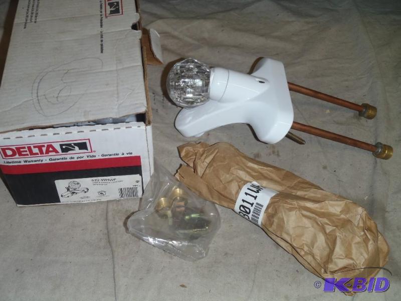 lot 63 image: Delta 1 Handle Sink Faucet