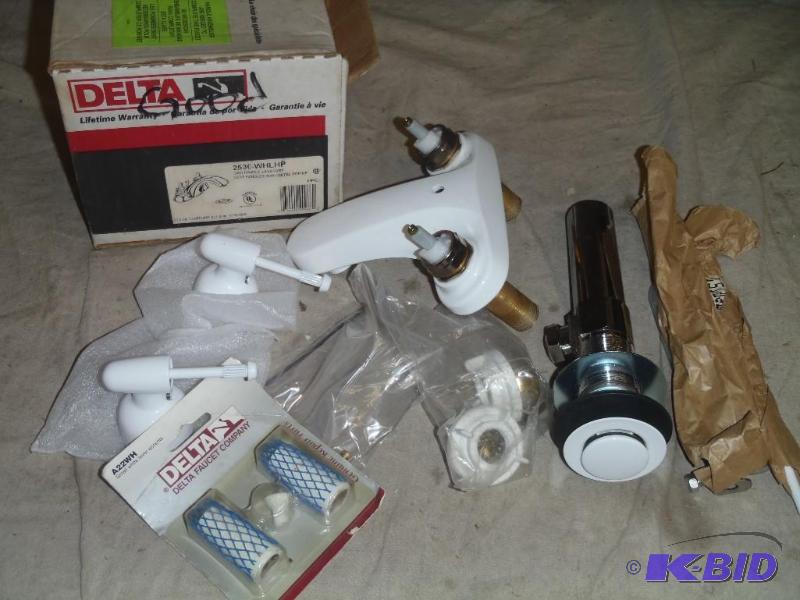 lot 65 image: Delta 2 Handle Sink Faucet