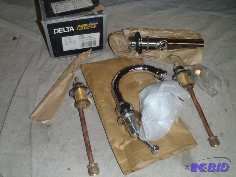 lot 67 image: Delta 2 Handle Sink Faucet