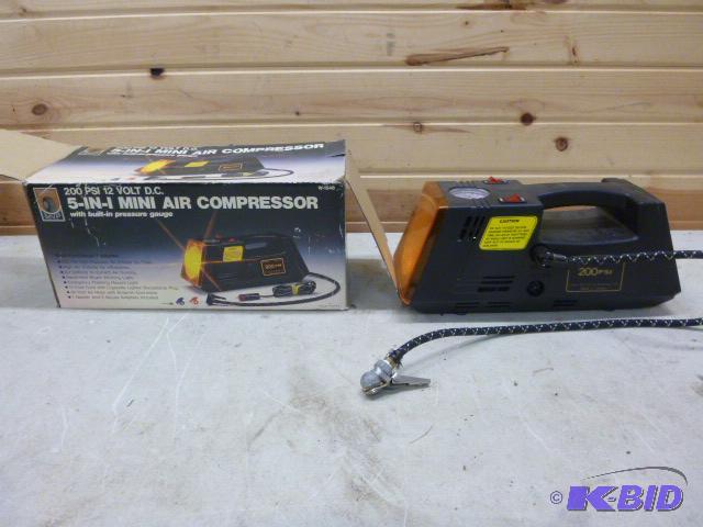 lot 131 image: Mini Air Compressor 12 volt....