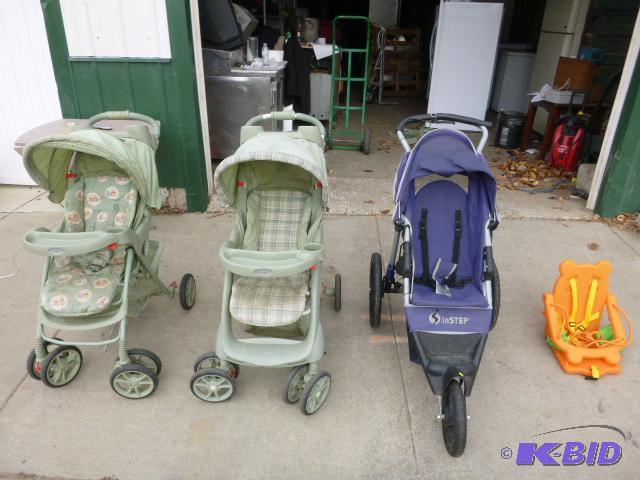 lot 242 image: Three Strollers and a Swing...