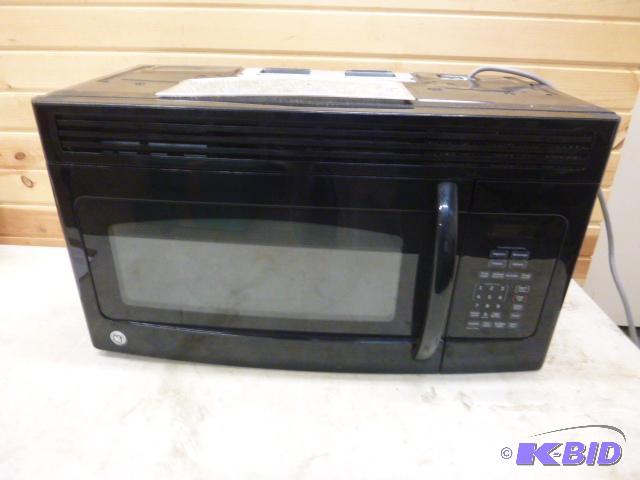 lot 60 image: GE Over-the-Stove Microwave Model JVM1540DN1B...