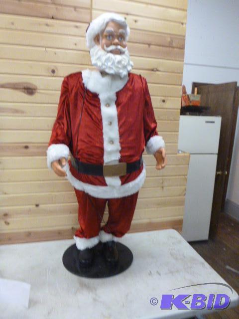 lot 65 image: Singing Santa 55" high....