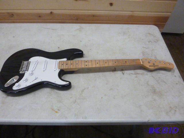lot 85 image: Behringer Electric Guitar Good condition....