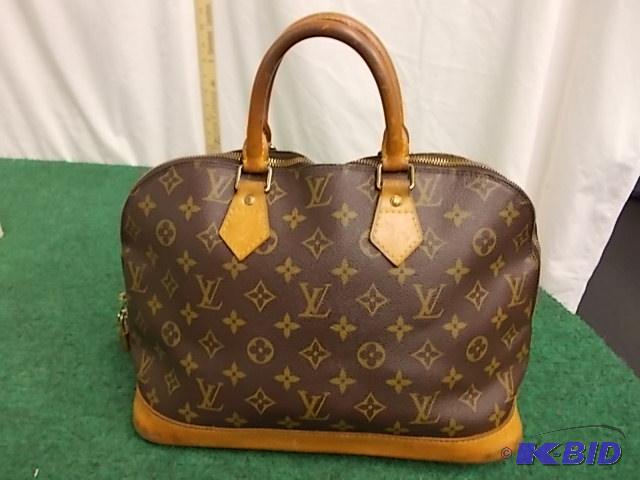 Louis Vuitton Hand Bag - Leather Has Some Pat...