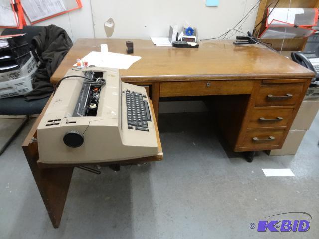 Vintage wood office desk. Includes typewriter...