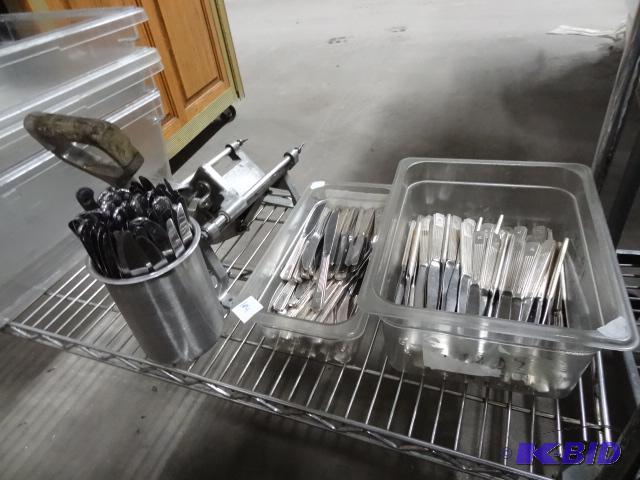 lot 104 image: 3 bins of misc table and butter knives...