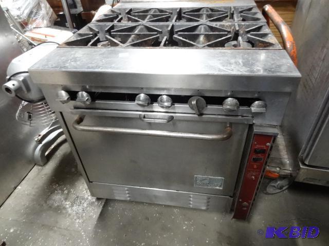 lot 33 image: South Bend 6 burner stove and oven. Natural g...