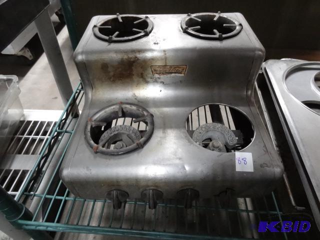 lot 88 image: Vintage Vaculator 4 burner stove. Natural sto...