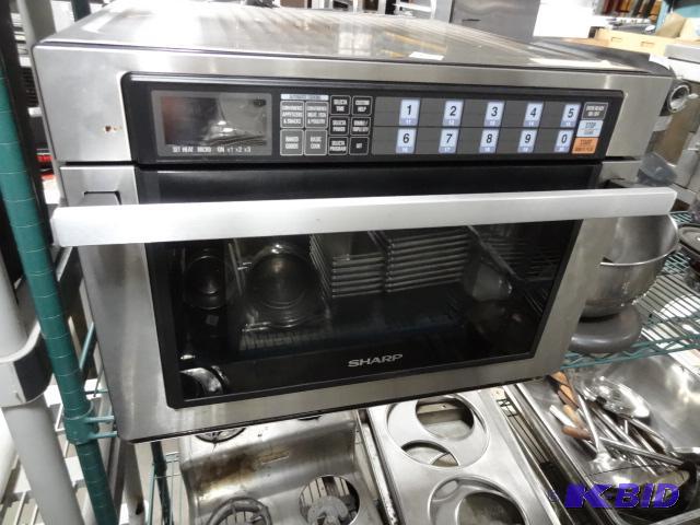 lot 91 image: Sharp commercial microwave oven. Model R-8000...
