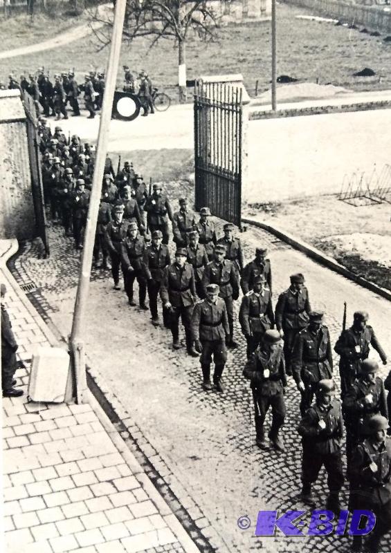 Lot of 4 authentic German photos WW2 Marching into towns