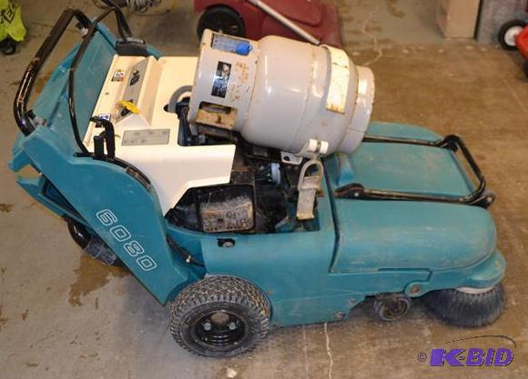 lot 135 image: Tennant 6080 Walk behind Propane Floor Sweepe...
