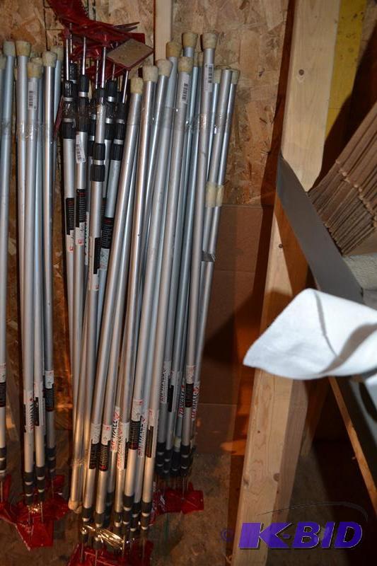 lot 28 image: Zip Wall brand spring loaded poles extend to ...