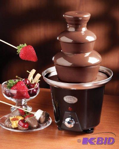 lot 28 image: Nostalgia Electrics CFF965 Mini Chocolate Fondue Fountain