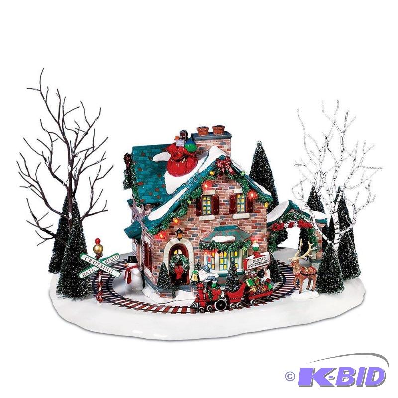 lot 58 image: Department 56 Christmas Lane Series Animated Snow Village, Santas Wonderland House