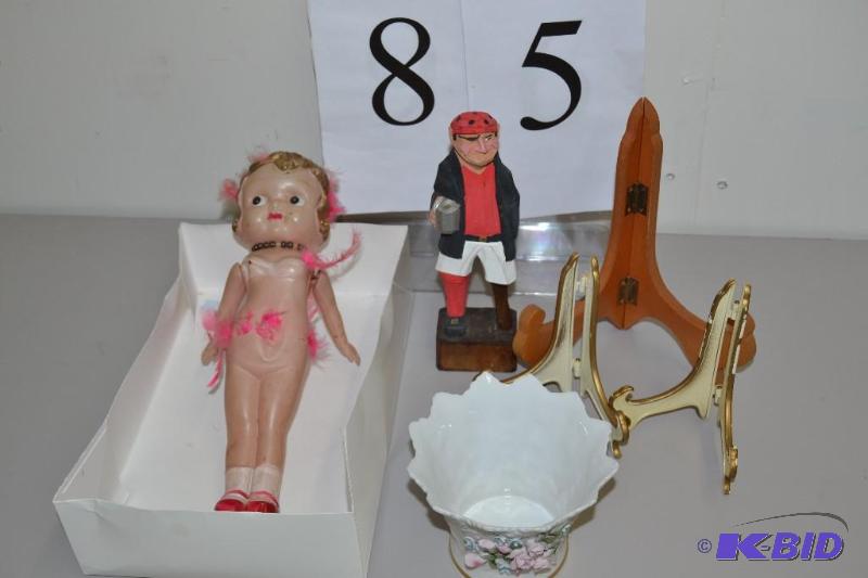 lot 85 image: Doll, wood carving, vase, display racks