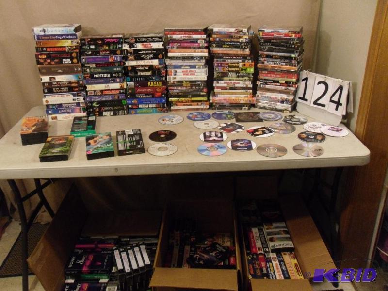 lot 124 image: Large Lot of Assorted DVDS and VHS Tapes. Som...