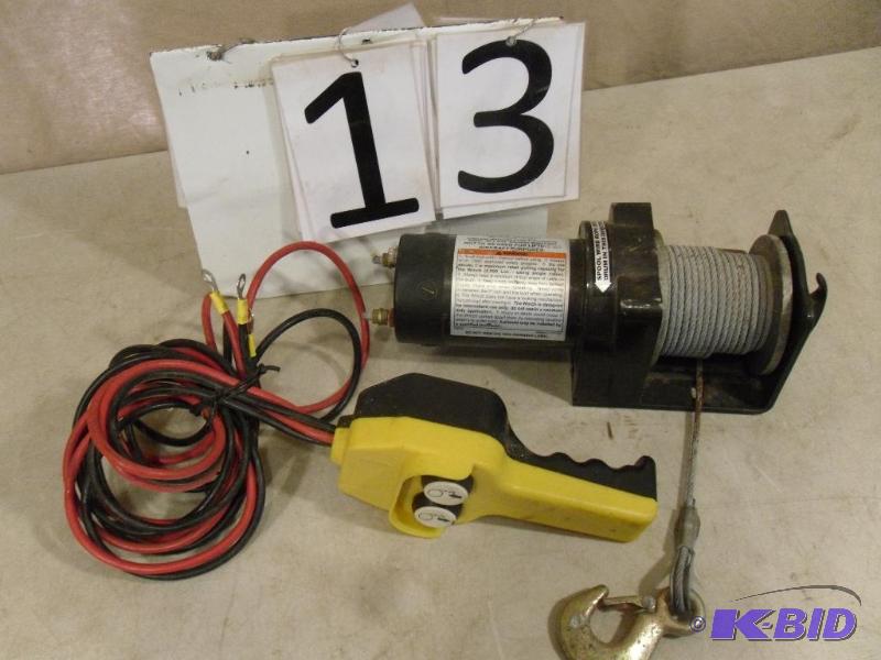 lot 13 image: 2000 lb Utility Winch. 12 Volt. 50 Ft. Was bo...