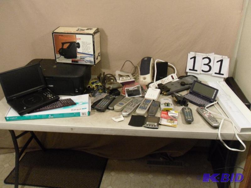 lot 131 image: Lot of Assorted Electronics. Portable DVD Pla...