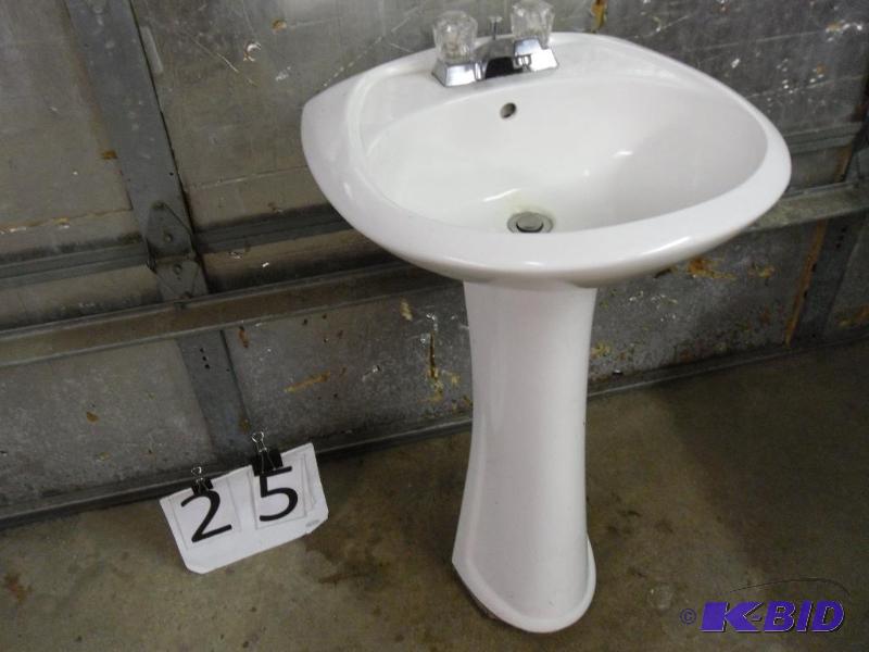 lot 25 image: Pedestal Sink. Needs cleaning. Scuffs, scratc...