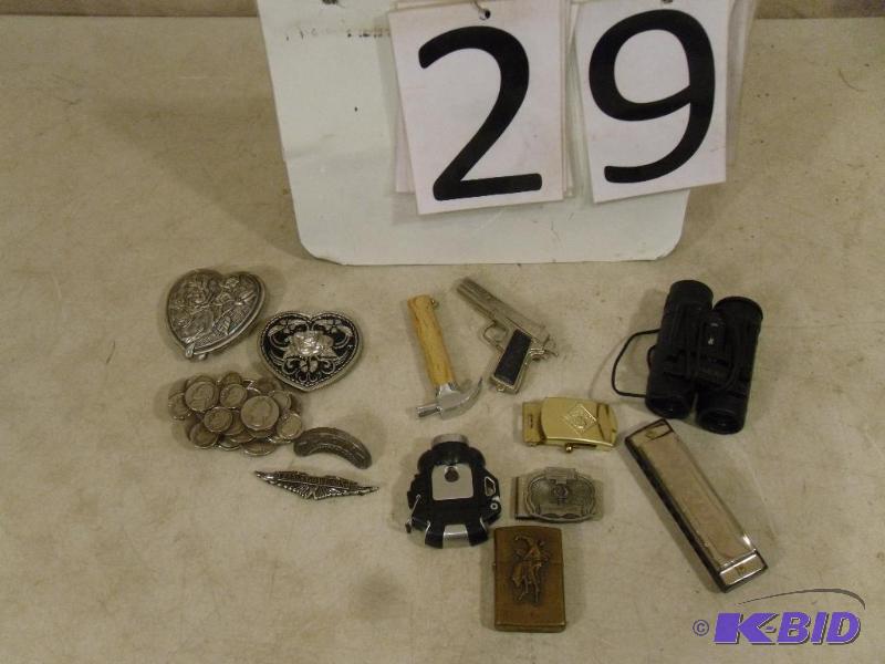 lot 29 image: Binoculars, Belt Buckles, Money Clip, Harmoni...