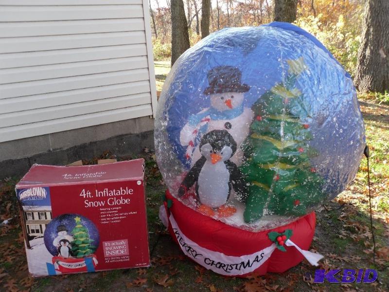 lot 4 image: 4 Ft Inflatable Snow Globe. Its actually snow...