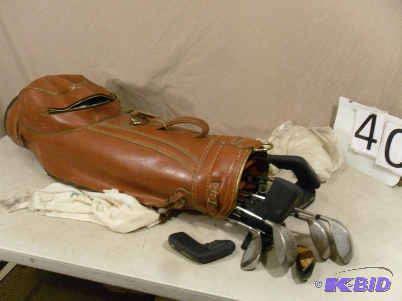 lot 40 image: Miller Golf Bag with Assorted Club, Balls, Ra...