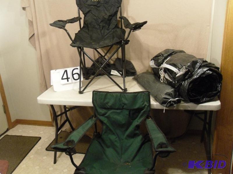lot 46 image: Large tent and two lawn chairs. Did not unrol...