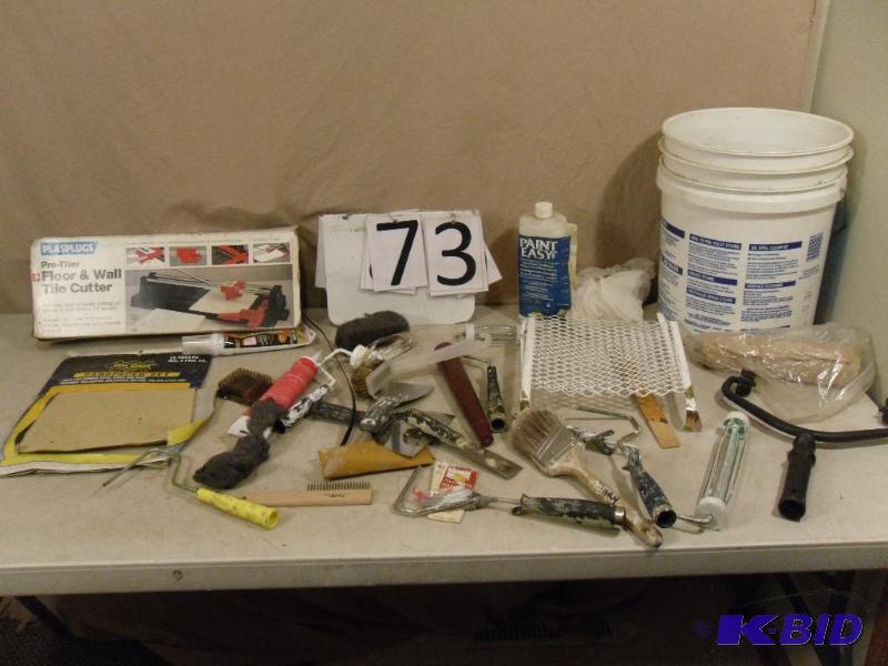 lot 73 image: Tile Cutter, Paint Supplies, and More. Comes ...